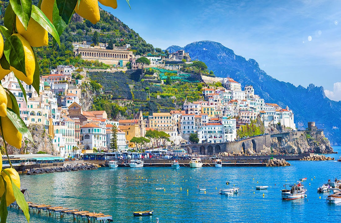 Panoramic view of beautiful Amalfi on hills leading down to coas