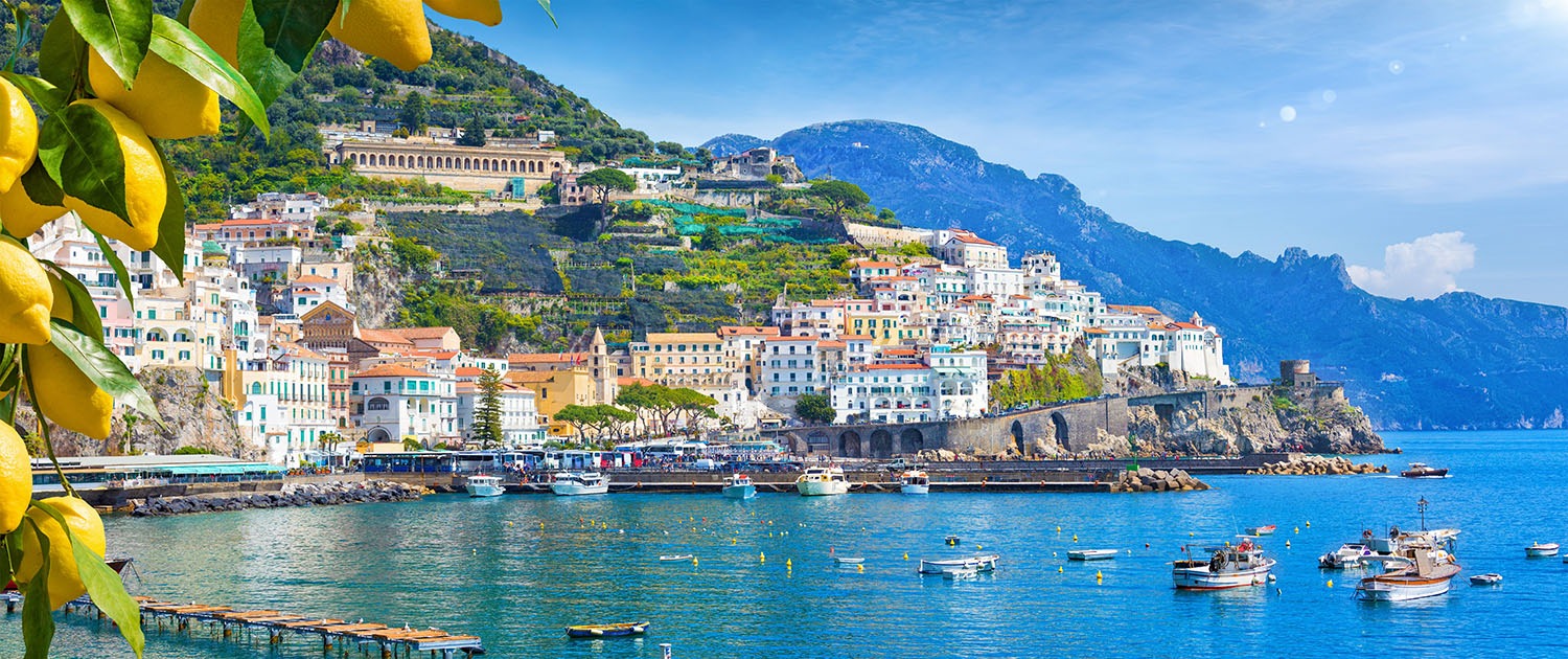 Panoramic view of beautiful Amalfi on hills leading down to coas