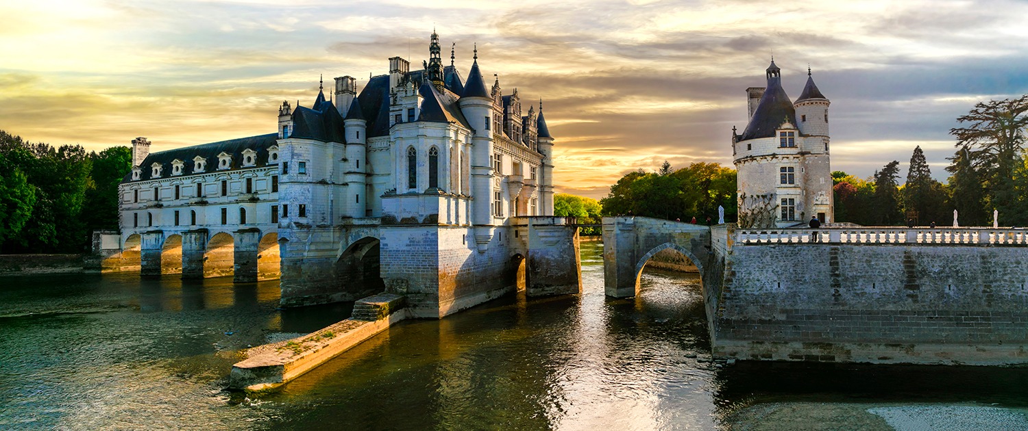 France, Loire valley castles. Elegant Chenonceau chateau over su