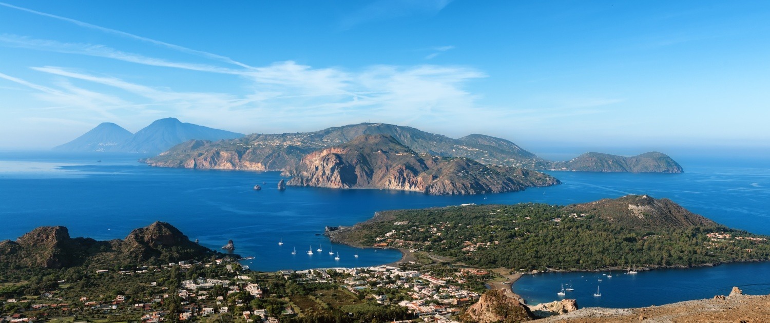 panoramic view of vulcano and lipari aeolian islands, italy