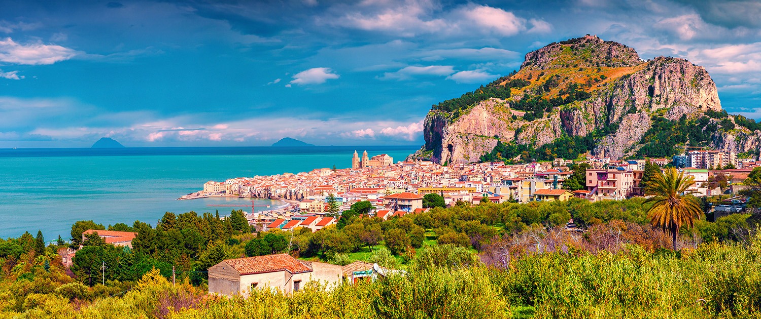 Sunny morning scene of seaside town Cefalu