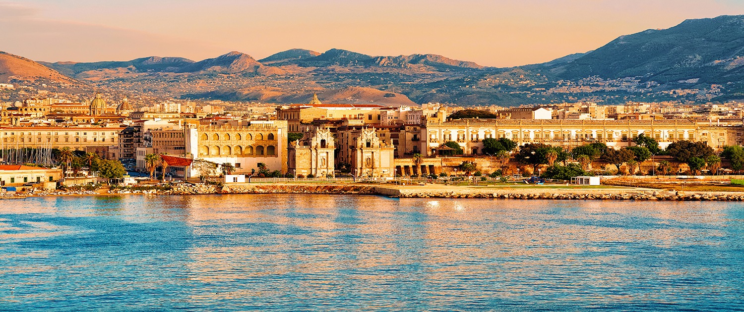 Sunrise at Mediterranian sea Sicily Palermo old city reflex