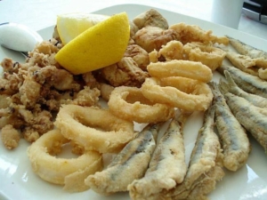 Pescaito Frito - a mix of fried fish, normally including calamares (squid), adobo (marinated dogfish), merluza (hake) and puntillitas (baby octopus). 